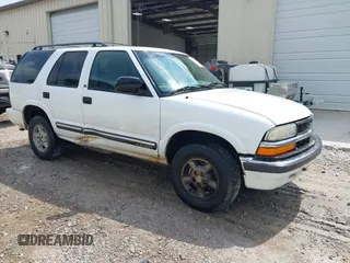 2001 Chevrolet Blazer LT z VIN 1GNDT13W712201180, wystawiony jako IAAI lot #42451872 z przebiegiem 88 433 mil mil oraz . Historia ofert i sprzedaży dostępna na DreamBid. Obrazek 1.