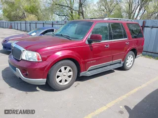 2004 Lincoln Navigator Luxury with VIN 5LMFU28R14LJ15068, listed as a IAAI auction lot 42078597 with 150,294 mi miles. Bid and sale history available at carsss.com. Image 2.