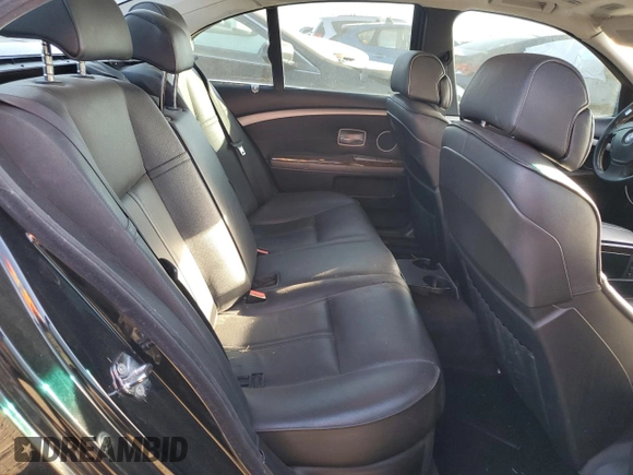 2007 BMW 7 Series 750i with VIN WBAHL83507DT07958, listed as a Copart auction lot 73318944 with 127,698 mi miles and Salvage Title. Bid and sale history available at DreamBid. Image 10.