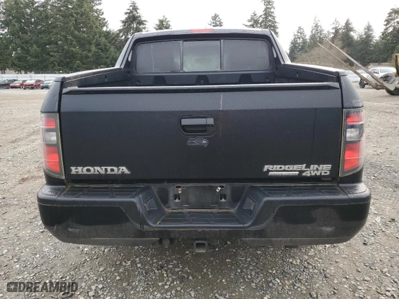 2014 Honda Ridgeline SE with VIN 5FPYK1F68EB012928, listed as a Copart auction lot 48702365 with 124,359 mi miles and Salvage Title. Bid and sale history available at carsss.com. Image 6.