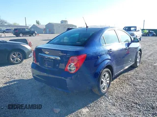 2014 Chevrolet Sonic LT with VIN 1G1JC5SH6E4164809, listed as a IAAI auction lot 42006407 with 105,710 mi miles and . Bid and sale history available at DreamBid. Image 4.