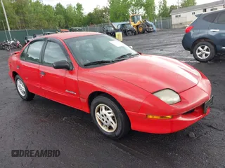 1999 Pontiac Sunfire SE z VIN 1G2JB5248X7528290, wystawiony jako IAAI lot #42252324 z przebiegiem 156 758 mil mil oraz . Historia ofert i sprzedaży dostępna na DreamBid. Obrazek 1.