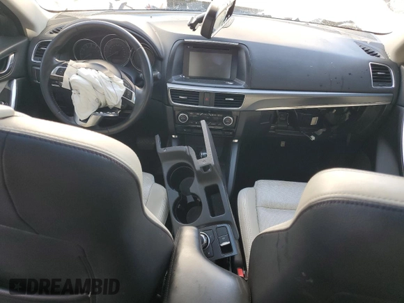 2016 Mazda CX-5 Grand Touring with VIN JM3KE4DY4G0669259, listed as a Copart auction lot 50470145 with 0 mi miles and Non Repairable. Bid and sale history available at carsss.com. Image 8.