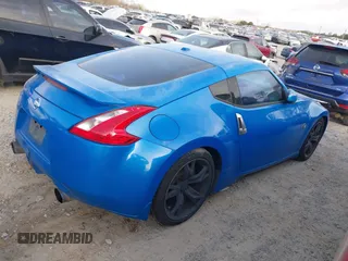 2009 Nissan 370Z Touring with VIN JN1AZ44E39M400201, listed as a IAAI auction lot 41710283 with 245,735 mi miles and . Bid and sale history available at DreamBid. Image 4.
