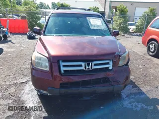 2007 Honda Pilot EX-L with VIN 5FNYF18547B006094, listed as a IAAI auction lot 42297719 with 235,632 mi miles and . Bid and sale history available at DreamBid. Image 12.