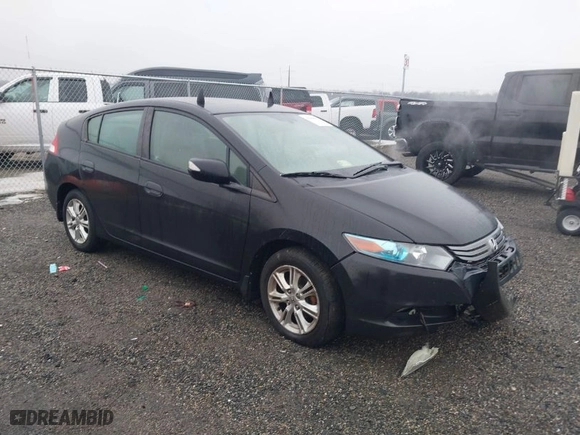 2011 Honda Insight EX with VIN JHMZE2H76BS010964, listed as a IAAI auction lot 41464087 with 122,380 mi miles. Bid and sale history available at carsss.com. Image 1.