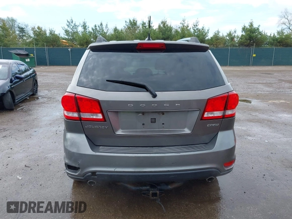 2012 Dodge Journey Crew z VIN 3C4PDCDG9CT146593, wystawiony jako IAAI lot #42127303 z przebiegiem 137 861 mil mil oraz . Historia ofert i sprzedaży dostępna na DreamBid. Obrazek 17.