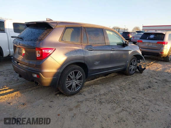 2020 Honda Passport EX-L with VIN 5FNYF7H55LB005906, listed as a IAAI auction lot 41322450 with 66,545 mi miles and . Bid and sale history available at DreamBid. Image 4.