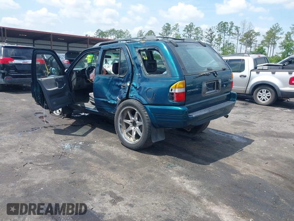 1999 Isuzu Rodeo S with VIN 4S2CK58W6X4332027, listed as a IAAI auction lot 42087396 with 258,508 mi miles and . Bid and sale history available at DreamBid. Image 3.