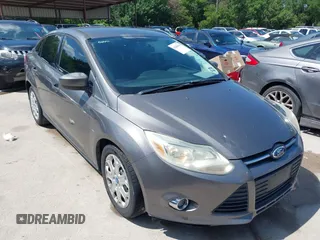 2012 Ford Focus SE with VIN 1FAHP3F28CL211898, listed as a IAAI auction lot 42466544 with 142,933 mi miles and . Bid and sale history available at DreamBid. Image 1.