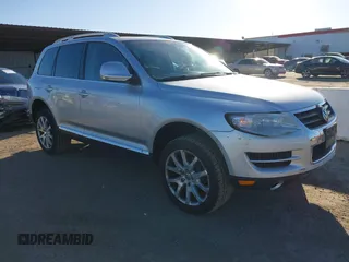 2010 Volkswagen Touareg VR6 with VIN WVGBF7A92AD001704, listed as a IAAI auction lot 41751316 with 80,597 mi miles and . Bid and sale history available at DreamBid. Image 1.