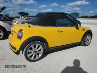 2015 MINI Roadster S z VIN WMWSY3C53FT595389, wystawiony jako Copart lot #77476814 z przebiegiem Nie podano mil oraz Szkody całkowita. Historia ofert i sprzedaży dostępna na DreamBid. Obrazek 3.