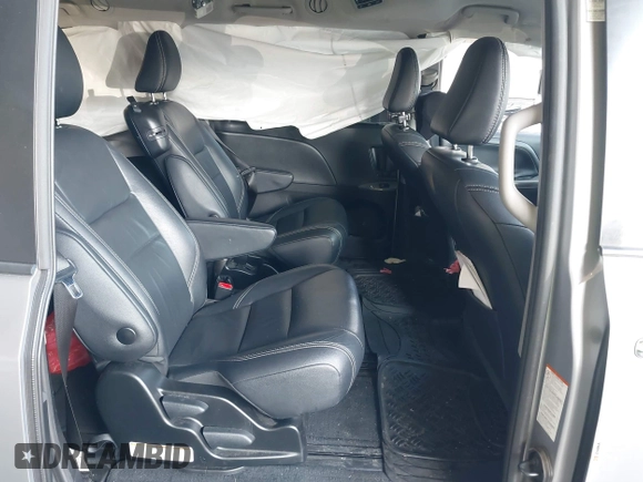 2018 Toyota Sienna SE with VIN 5TDXZ3DC0JS950481, listed as a IAAI auction lot 42404211 with 87,697 mi miles and . Bid and sale history available at DreamBid. Image 8.