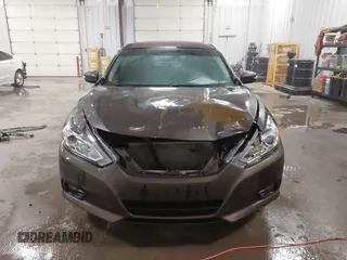 2016 Nissan Altima 2.5 S with VIN 1N4AL3AP4GC145811, listed as a IAAI auction lot 41424415 with 124,224 mi miles. Bid and sale history available at carsss.com. Image 13.