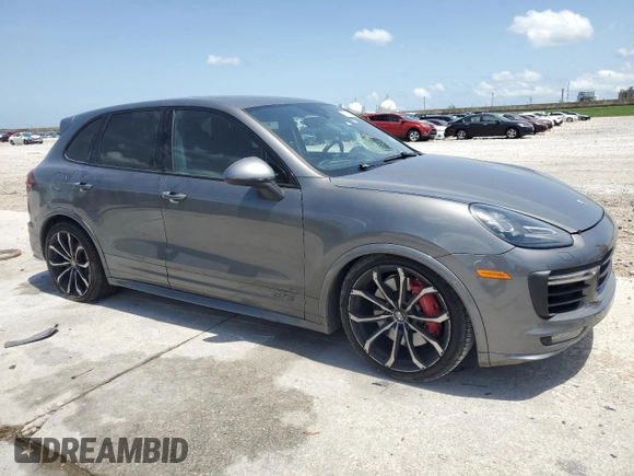 2017 Porsche Cayenne GTS with VIN WP1AD2A24HLA82506, listed as a Copart auction lot 57080515 with 150,113 mi miles and Clean title. Bid and sale history available at DreamBid. Image 4.
