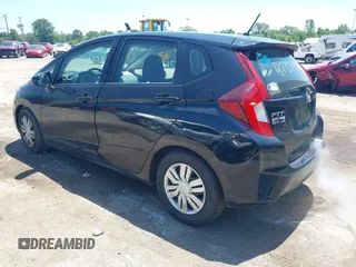 2015 Honda Fit LX z VIN 3HGGK5H56FM712266, wystawiony jako IAAI lot #42378228 z przebiegiem 140 423 mil mil oraz . Historia ofert i sprzedaży dostępna na DreamBid. Obrazek 3.
