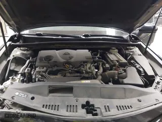 2018 Toyota Camry LE with VIN JTNB11HKXJ3048974, listed as a IAAI auction lot 41879941 with 102,377 mi miles. Bid and sale history available at carsss.com. Image 10.