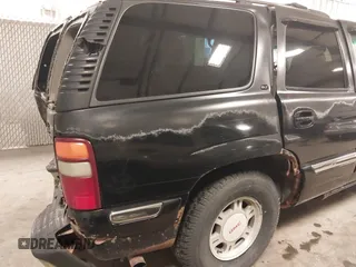 2000 GMC Yukon SLT with VIN 1GKEK13T1YJ176643, listed as a IAAI auction lot 41729346 with 265,124 mi miles. Bid and sale history available at carsss.com. Image 18.