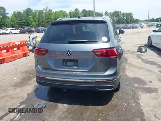 2023 Volkswagen Tiguan SE with VIN 3VV3B7AX3PM118743, listed as a IAAI auction lot 42291956 with 32,776 mi miles and . Bid and sale history available at DreamBid. Image 4.