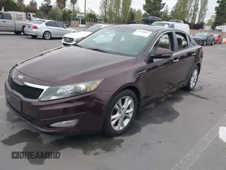 2013 Kia Optima LX z VIN 5XXGM4A72DG208410, wystawiony jako IAAI lot #42078867 z przebiegiem 89 033 mil mil oraz . Historia ofert i sprzedaży dostępna na DreamBid. Obrazek 2.