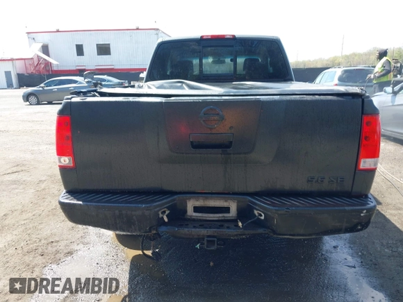 2005 Nissan Titan XE with VIN 1N6BA06A35N569289, listed as a IAAI auction lot 41985387 with 227,117 mi miles. Bid and sale history available at carsss.com. Image 16.