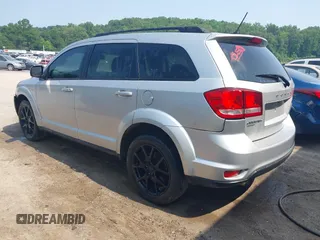 2013 Dodge Journey SXT with VIN 3C4PDDBG3DT661924, listed as a IAAI auction lot 42430211 with Not provided miles and . Bid and sale history available at DreamBid. Image 3.