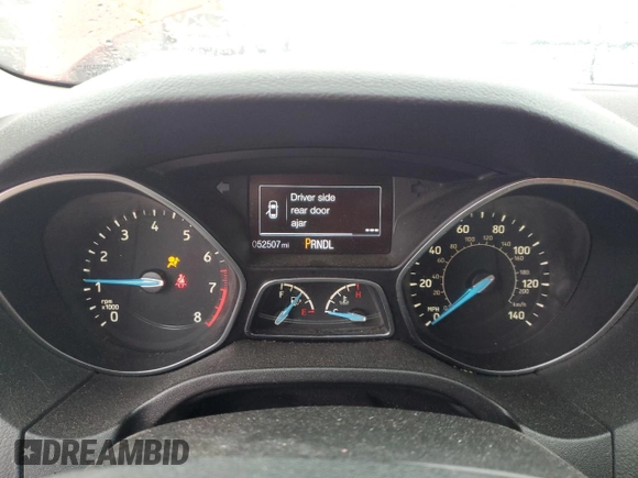 2015 Ford Focus SE with VIN 1FADP3F27FL356109, listed as a Copart auction lot 56828435 with 52,507 mi miles and Clean title. Bid and sale history available at DreamBid. Image 9.