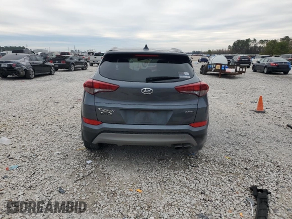 2018 Hyundai Tucson Sport with VIN KM8J33AL2JU707497, listed as a Copart auction lot 87053564 with 84,274 mi miles and Clean Title. Bid and sale history available at carsss.com. Image 6.