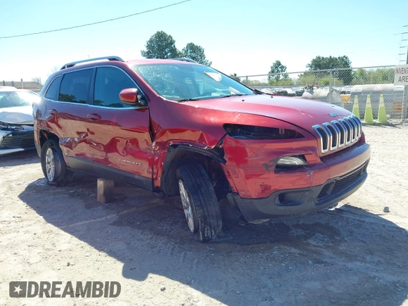 2015 Jeep Cherokee North with VIN 1C4PJMCSXFW654090, listed as a IAAI auction lot 41844434 with 198,592 mi miles. Bid and sale history available at carsss.com. Image 1.