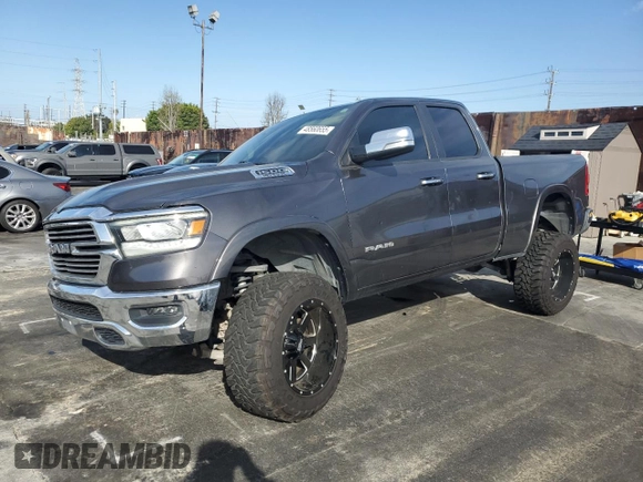 2020 Ram 1500 Laramie with VIN 1C6SRFDT1LN263036, listed as a Copart auction lot 48560655 with 130,923 mi miles and Salvage Title. Bid and sale history available at carsss.com. Image 1.