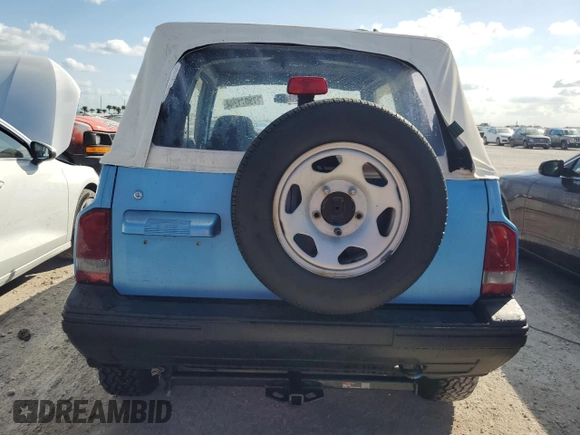 1994 Geo Tracker z VIN 2CNBE18U0R6940807, wystawiony jako Copart lot #78071244 z przebiegiem 116 472 mil mil oraz Nie do naprawy. Historia ofert i sprzedaży dostępna na DreamBid. Obrazek 6.