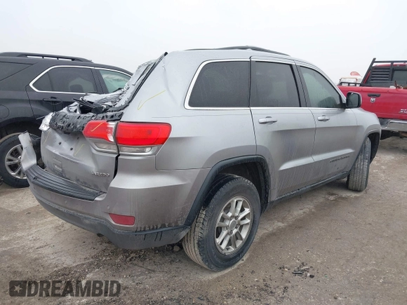 2018 Jeep Grand Cherokee Laredo E with VIN 1C4RJEAG8JC382825, listed as a IAAI auction lot 41288056 with 105,652 mi miles. Bid and sale history available at carsss.com. Image 4.
