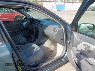 2001 Toyota Camry CE with VIN 4T1BG28K91U852861, listed as a IAAI auction lot 41912480 with 217,404 mi miles. Bid and sale history available at carsss.com. Image 5.