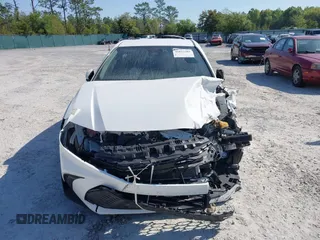 2025 Toyota Camry LE with VIN 4T1DAACK0SU551828, listed as a IAAI auction lot 41823385 with Not Provided miles and . Bid and sale history available at DreamBid. Image 12.