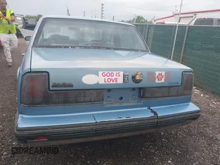 1991 Oldsmobile Delta z VIN 1G3HN54C6M1809377, wystawiony jako IAAI lot #42275221 z przebiegiem 139 509 mil mil oraz . Historia ofert i sprzedaży dostępna na DreamBid. Obrazek 16.
