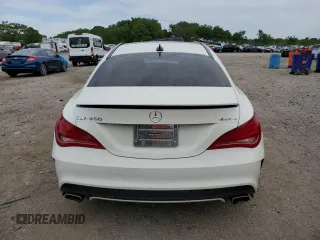 2014 Mercedes-Benz CLA 250 with VIN WDDSJ4GB3EN124980, listed as a Copart auction lot 57704585 with 86,643 mi miles and Salvage title. Bid and sale history available at DreamBid. Image 6.