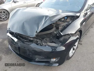 2016 Tesla Model S 90D z VIN 5YJSA1E26GF156108, wystawiony jako IAAI lot #41453148 z przebiegiem 74 717 mil mil oraz . Historia ofert i sprzedaży dostępna na DreamBid. Obrazek 6.