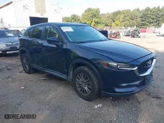 2017 Mazda CX-5 Touring with VIN JM3KFBCL6H0170455, listed as a IAAI auction lot 40381242 with 71,520 mi miles. Bid and sale history available at carsss.com. Image 1.