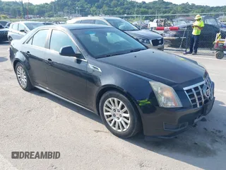 2012 Cadillac CTS Luxury with VIN 1G6DG5E5XC0107370, listed as a IAAI auction lot 42598763 with 171,758 mi miles and . Bid and sale history available at DreamBid. Image 1.