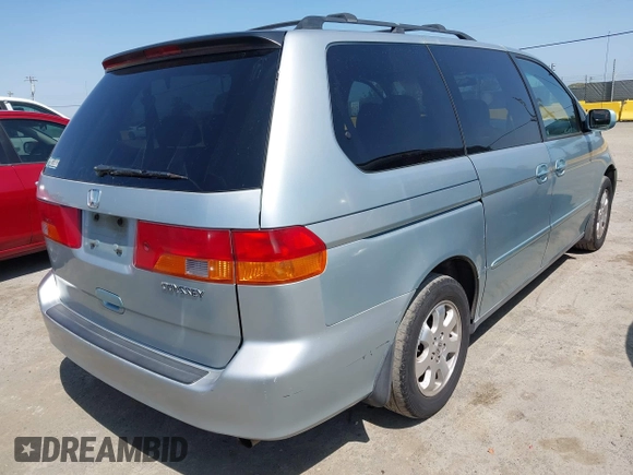 2003 Honda Odyssey EX with VIN 2HKRL18633H502246, listed as a IAAI auction lot 42414427 with 251,759 mi miles and . Bid and sale history available at DreamBid. Image 4.