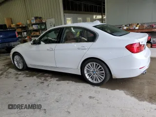 2013 BMW 3 Series 328i with VIN WBA3A5G52DNP18972, listed as a Copart auction lot 58122935 with 209,173 mi miles and Salvage title. Bid and sale history available at DreamBid. Image 2.