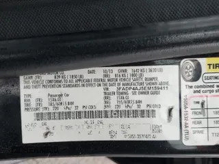2014 Ford Fiesta S with VIN 3FADP4AJ5EM159411, listed as a Copart auction lot 48252435 with 115,484 mi miles and Salvage title. Bid and sale history available at DreamBid. Image 14.