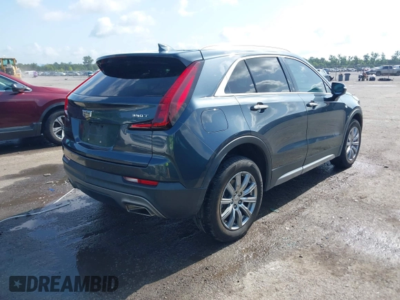 2021 Cadillac XT4 FWD Premium Luxury with VIN 1GYFZCR42MF007617, listed as a IAAI auction lot 42437974 with 126,071 mi miles and . Bid and sale history available at DreamBid. Image 4.