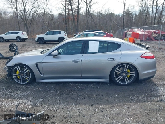 2012 Porsche Panamera с VIN WP0AA2A74CL016133, выставлен на аукционе IAAI как лот 41753535 с пробегом 84 569 миль миль и . История ставок и продаж доступна на DreamBid. Изображение 14.