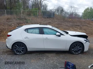 2023 Mazda 3 S Preferred with VIN JM1BPALMXP1607956, listed as a IAAI auction lot 41922025 with 58,193 mi miles and . Bid and sale history available at DreamBid. Image 14.