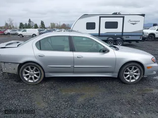 2002 Infiniti I35 Luxury with VIN JNKDA31A22T005398, listed as a IAAI auction lot 41818757 with 165,228 mi miles. Bid and sale history available at carsss.com. Image 13.
