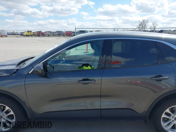 2020 Ford Escape SE with VIN 1FMCU9G66LUA77223, listed as a IAAI auction lot 42040652 with 85,589 mi miles and . Bid and sale history available at DreamBid. Image 15.