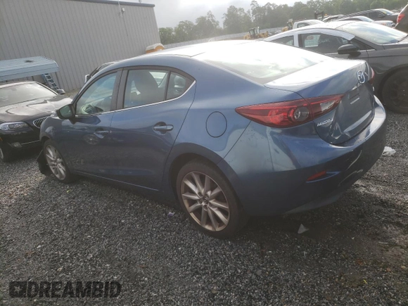2017 Mazda 3 Touring with VIN 3MZBN1V77HM123452, listed as a Copart auction lot 57786485 with 117,811 mi miles and Salvage title. Bid and sale history available at DreamBid. Image 2.