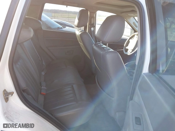 2007 Jeep Grand Cherokee Laredo with VIN 1J8GR48K37C525797, listed as a IAAI auction lot 41929118 with 244,092 mi miles. Bid and sale history available at carsss.com. Image 8.