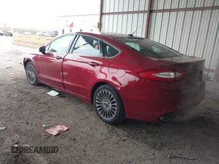 2014 Ford Fusion Titanium with VIN 3FA6P0K97ER204843, listed as a IAAI auction lot 41614434 with 110,165 mi miles. Bid and sale history available at carsss.com. Image 3.